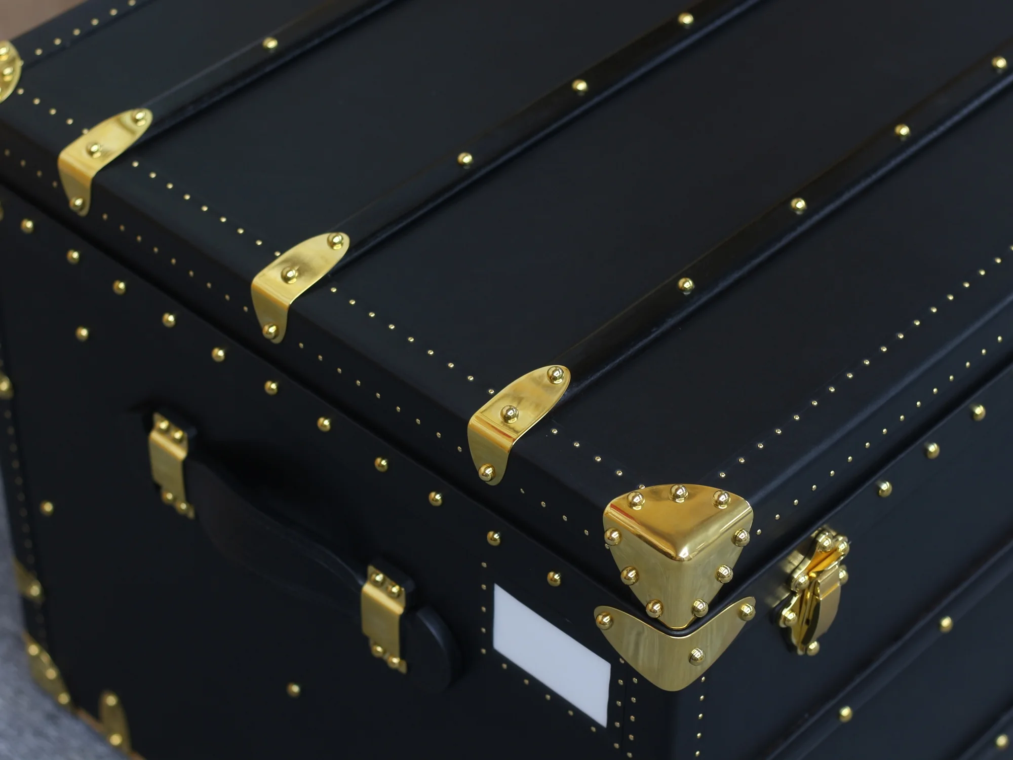 Black Collector's Trunk, top corner and hardware detail