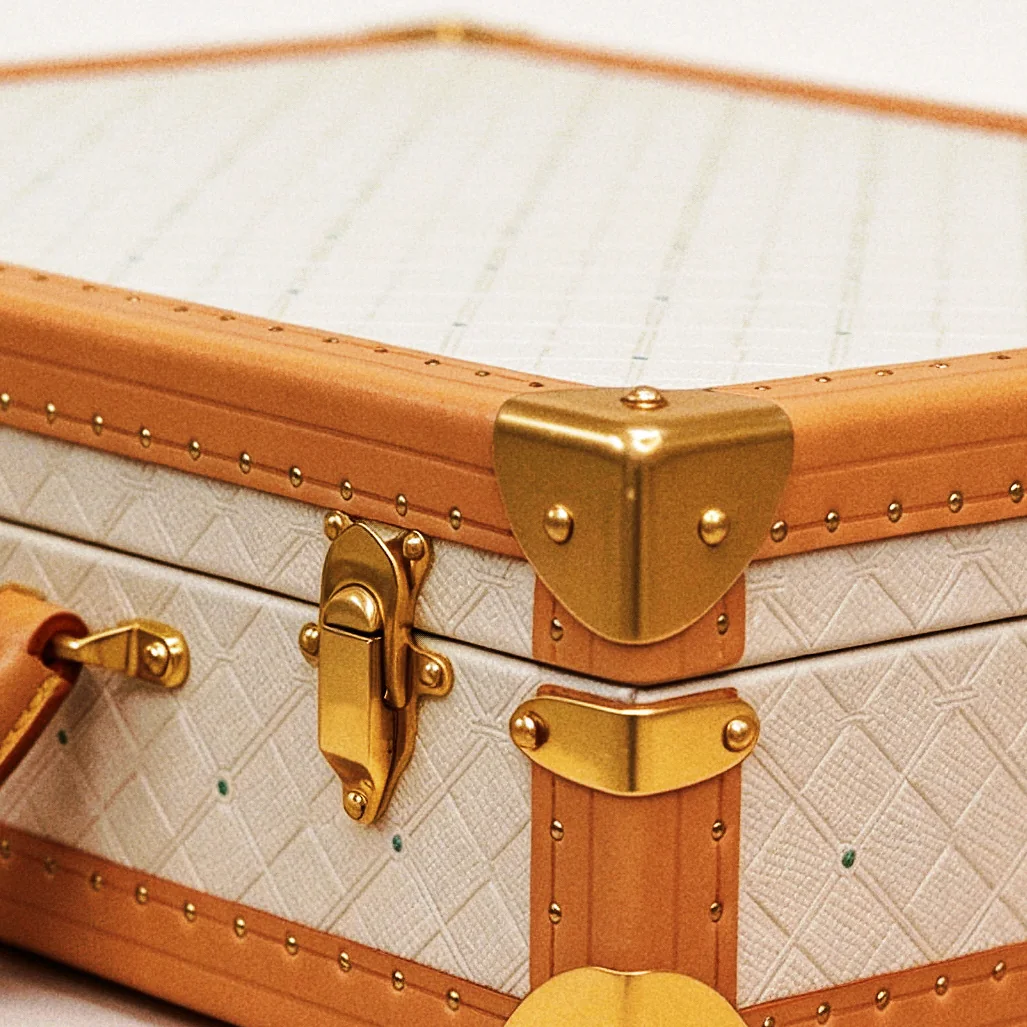 Fifteen Watch Case, gold-tone lock and edge detail