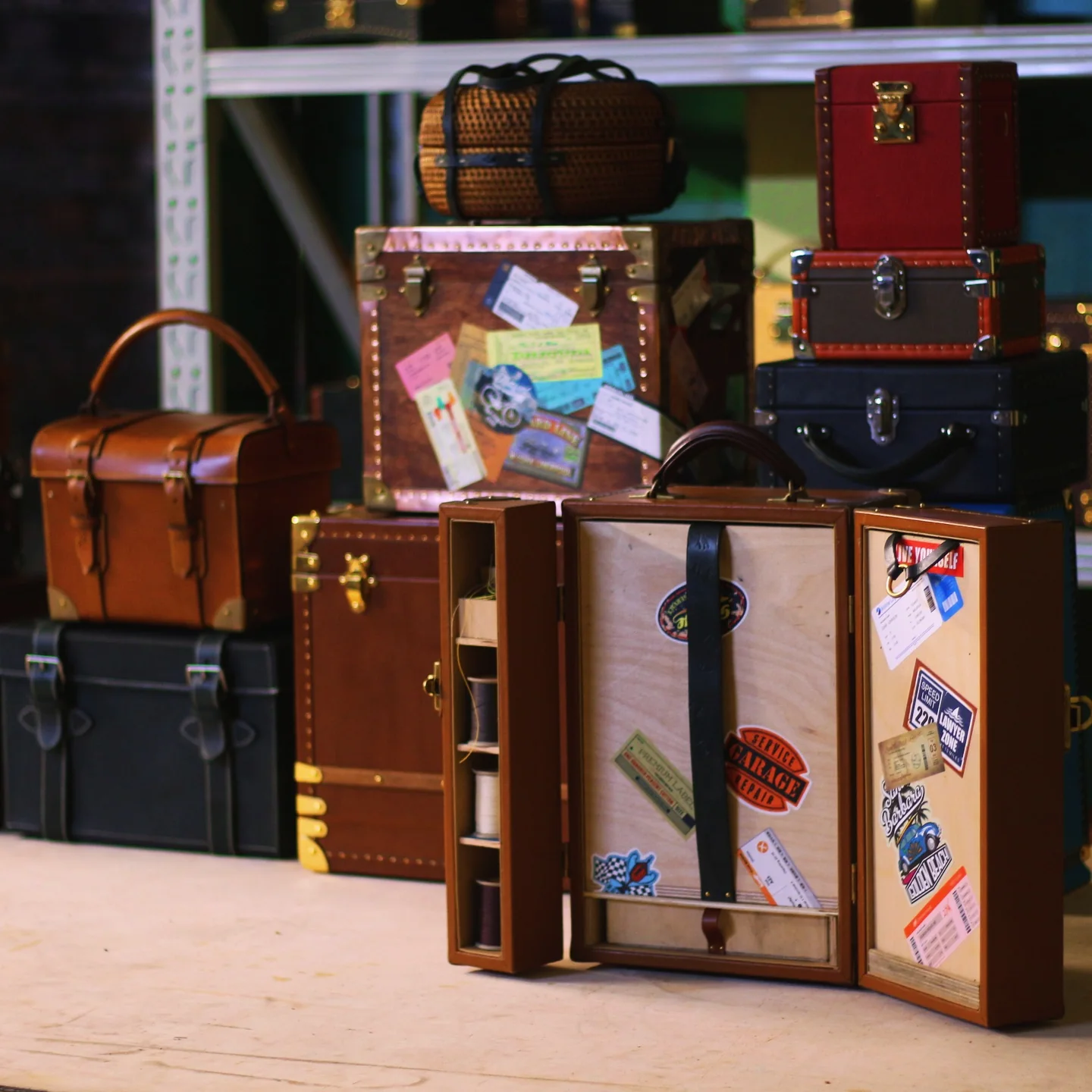 A selection of handcrafted trunks and cases displayed together